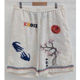 【KHOKI(コッキ】Hand enbroidered-design pants/White